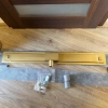 SaniteModar odpływ podłogowy ze stali nierdzewnej 94 cm, złota płytka