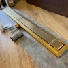 SaniteModar odpływ podłogowy ze stali nierdzewnej 94 cm, złota płytka